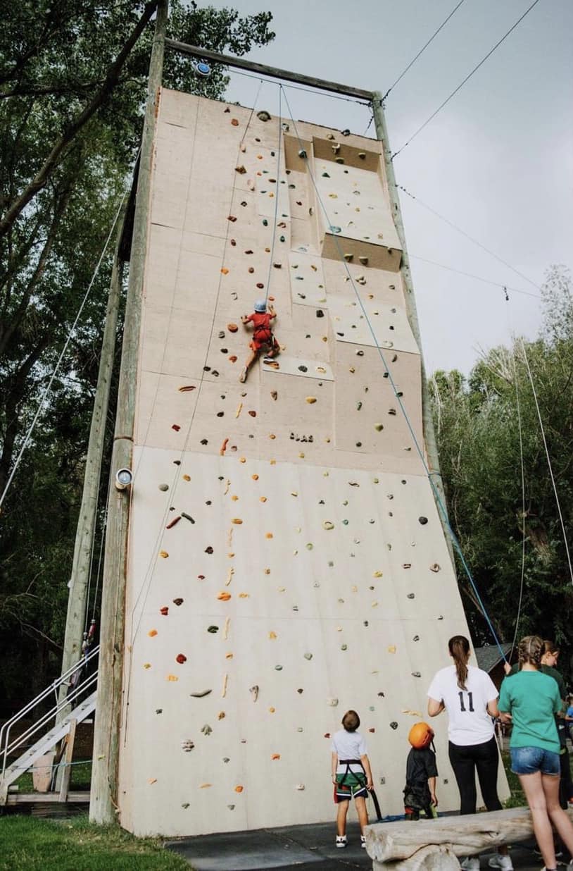 Kids rock climbing at a Chosen Connection event